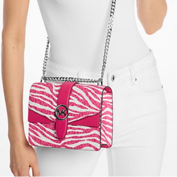Michael Kors Handbags - Dragonfruit
Michael Kors Greenwich Small Animal Print
Logo Crossbody